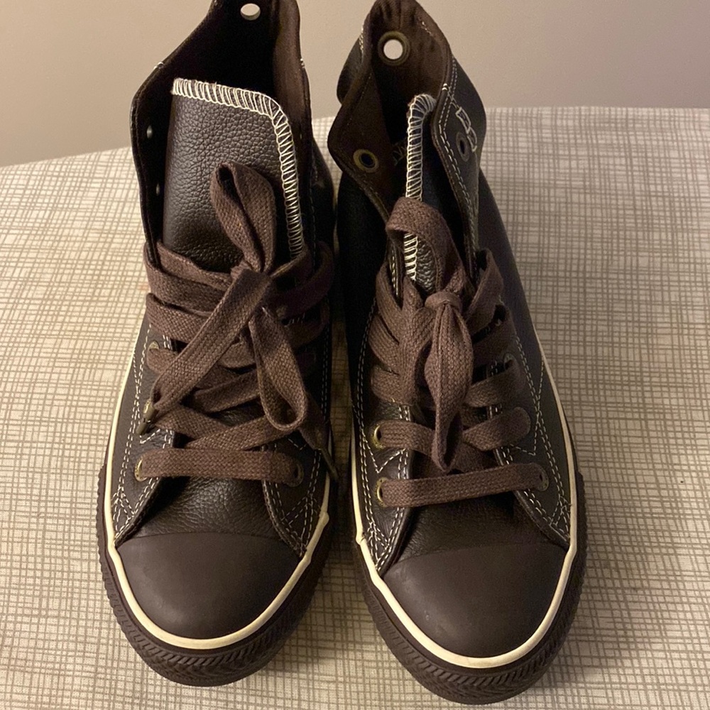 Brown leather converse